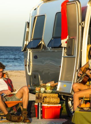 Friends caravanning at Merry Beach in Shoalhaven, South Coast