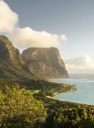 Scenic coastal views across Lord Howe Island to Mount Lidgbird and Mount Gower