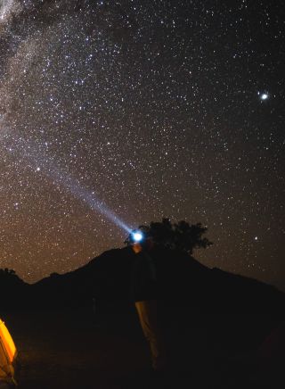 The night sky filled with bright stars over the dark sky park in the Warrumbungles