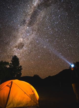 The night sky filled with bright stars over the dark sky park in the Warrumbungles
