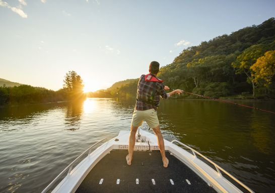 Man enjoying an afternoon of fishing on the Hawkesbury River, Wisemans Ferry