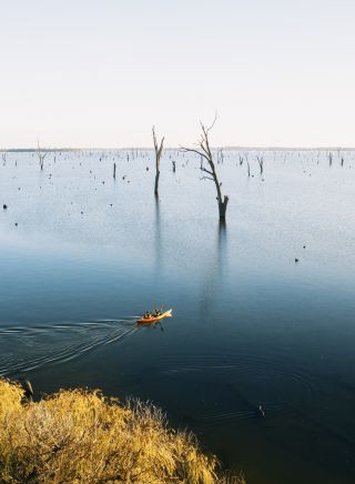 Couple enjoying an afternoon of kayaking along Lake Mulwala, Mulwala