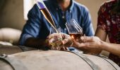 Couple enjoying a visit to Corowa Whisky & Chocolate in Corowa, The Murray