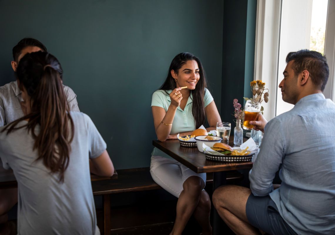 Couple enjoying food and drink at Mountain Culture Beer Co. in Katoomba, Blue Mountains