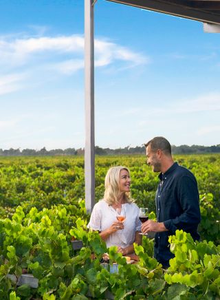 Couple enjoying visit to Yarran Wines, Yenda