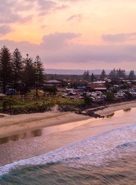 Sun setting over Main Beach, Byron Bay