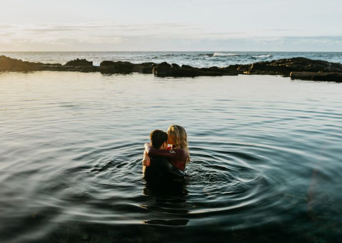 Bermagui Blue Pool, Bermagui Couple enjoying the ocean pool at Bermagui Blue Pool, Bermagui