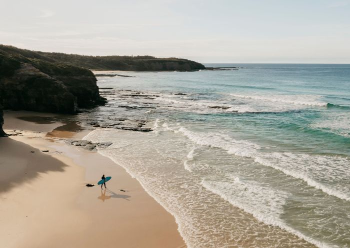 Rennies Beach, Ulladulla Aerial view of the beach with a lone surfer at Rennies Beach, Ulladulla