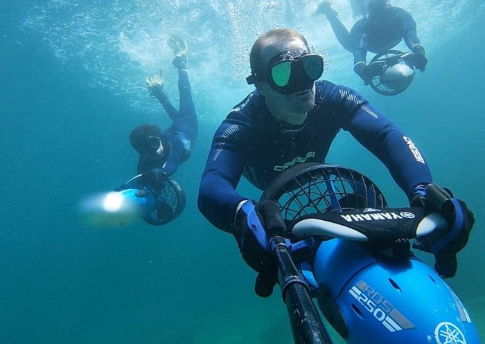 Sydney Underwater Scooter Tours, Gordons Bay - Credit: Chris Harding Man diving with Sydney Underwater Scooter Tours, Gordons Bay