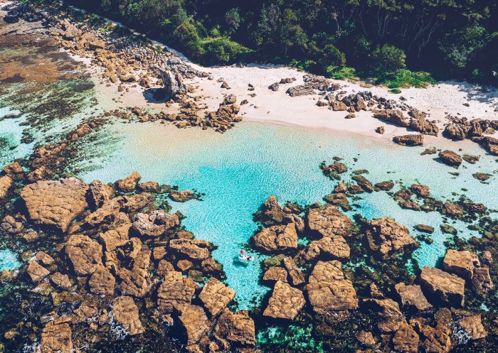 Mollymook Bogey Hole, Mollymook - Credit: Shoalhaven Tourism Aerial view of people swimming at Mollymook Bogey Hole, Mollymook